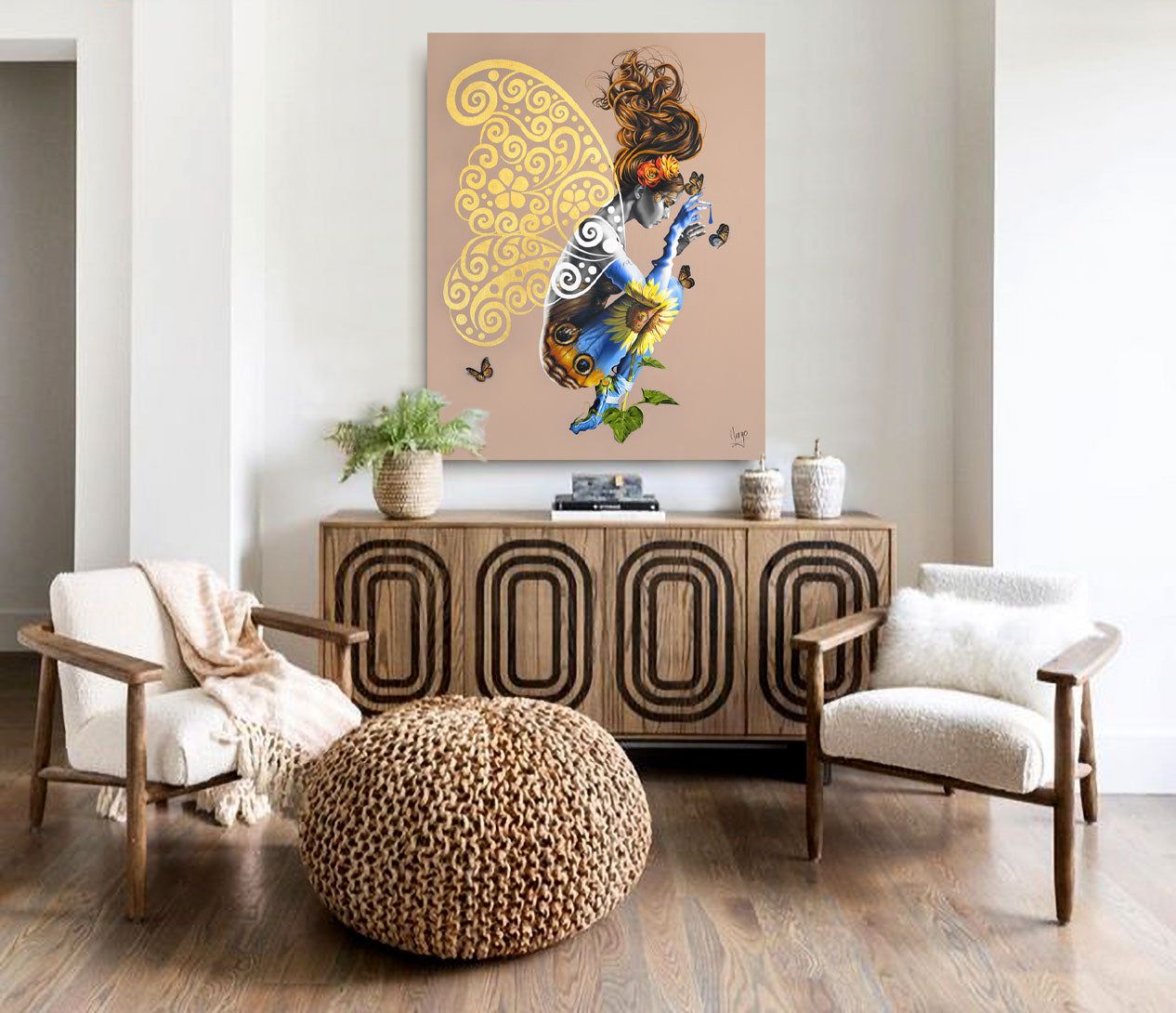 Woman painting representing the earth element of life with wings, butterflies and sunflower